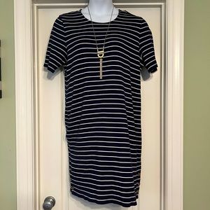 Chico’s size 3 knit dress. Buttons accessorize the hem.